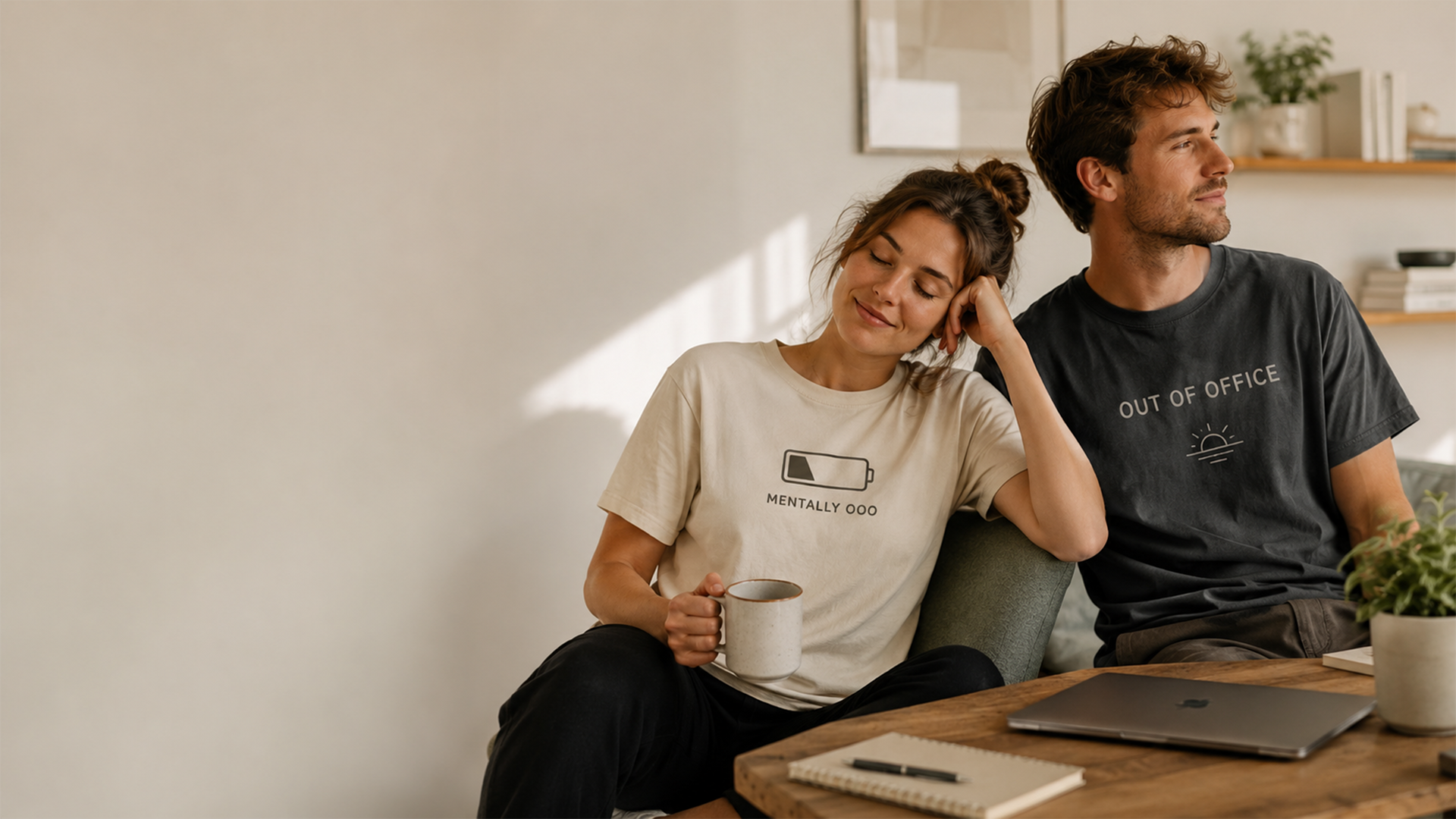 Two people relaxing at home in Mentally OOO graphic T-shirts